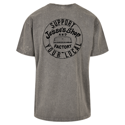 Mockup of support your local Tee in asphalt grey acid wash, featuring support your local graphic on the back.