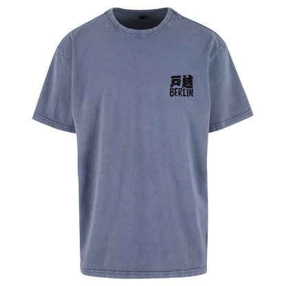 JSF support your local Tee mockup in vintage blue acid wash featuring Togoshi Berlin chest logo.