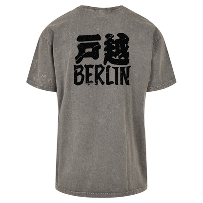 JSF Togoshi x Berlin Tee mockup in asphalt grey acid wash featuring bold Togoshi Berlin back print .